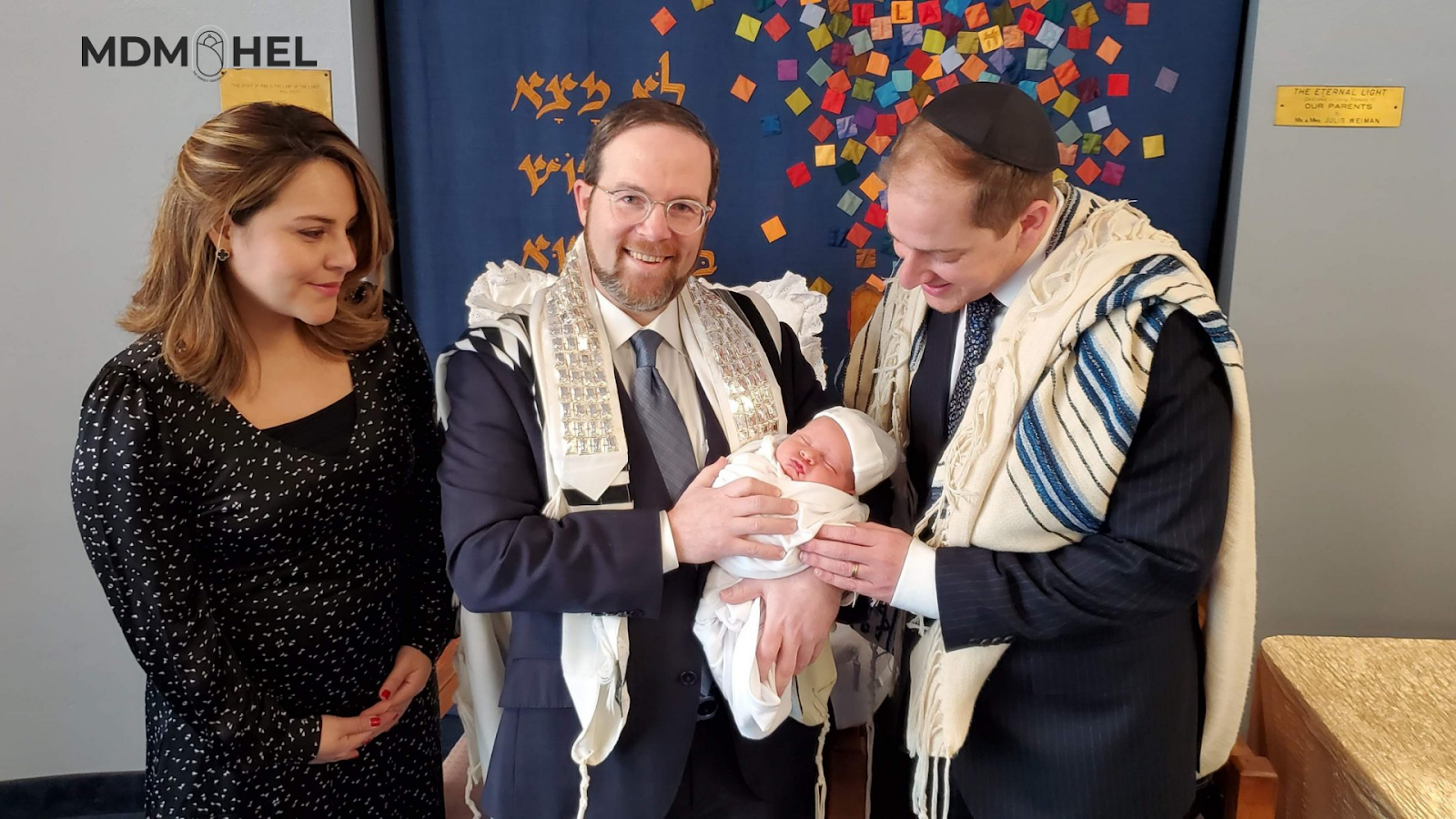 Rabbi Rappaport holding baby