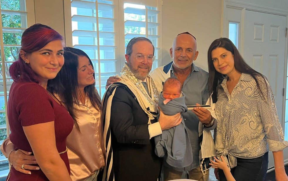 new born family and rabbi